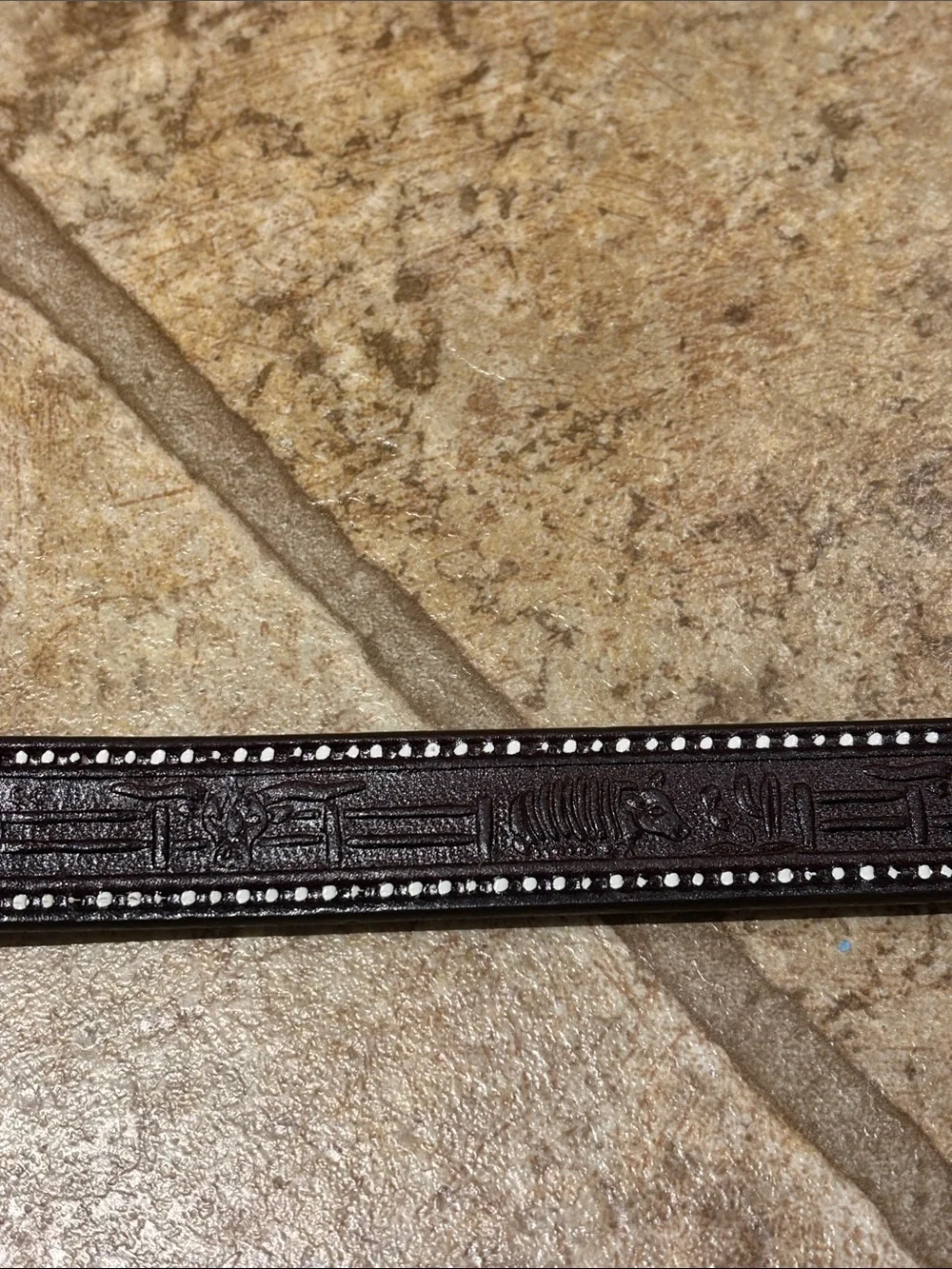 Hand-tooled edible leather belt by Mexican artisans. Size S /36 inches long